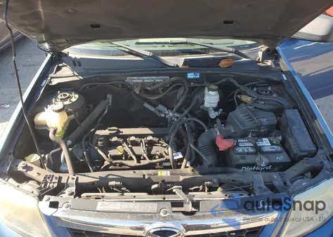 2009 Mazda Tribute I from USA, damaged, VIN 4F2CZ02789KM03061